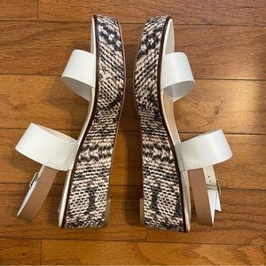 Gorgeous Cole Haan white leather wedges with snake skin styling. Never worn
